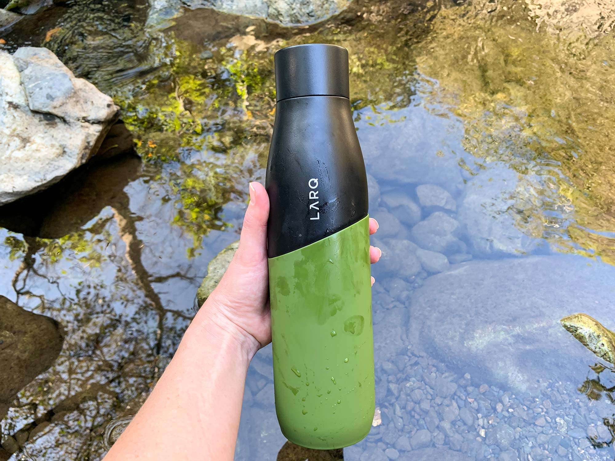 LARQ-Bottle-Movement-held-straight-on-in-water
