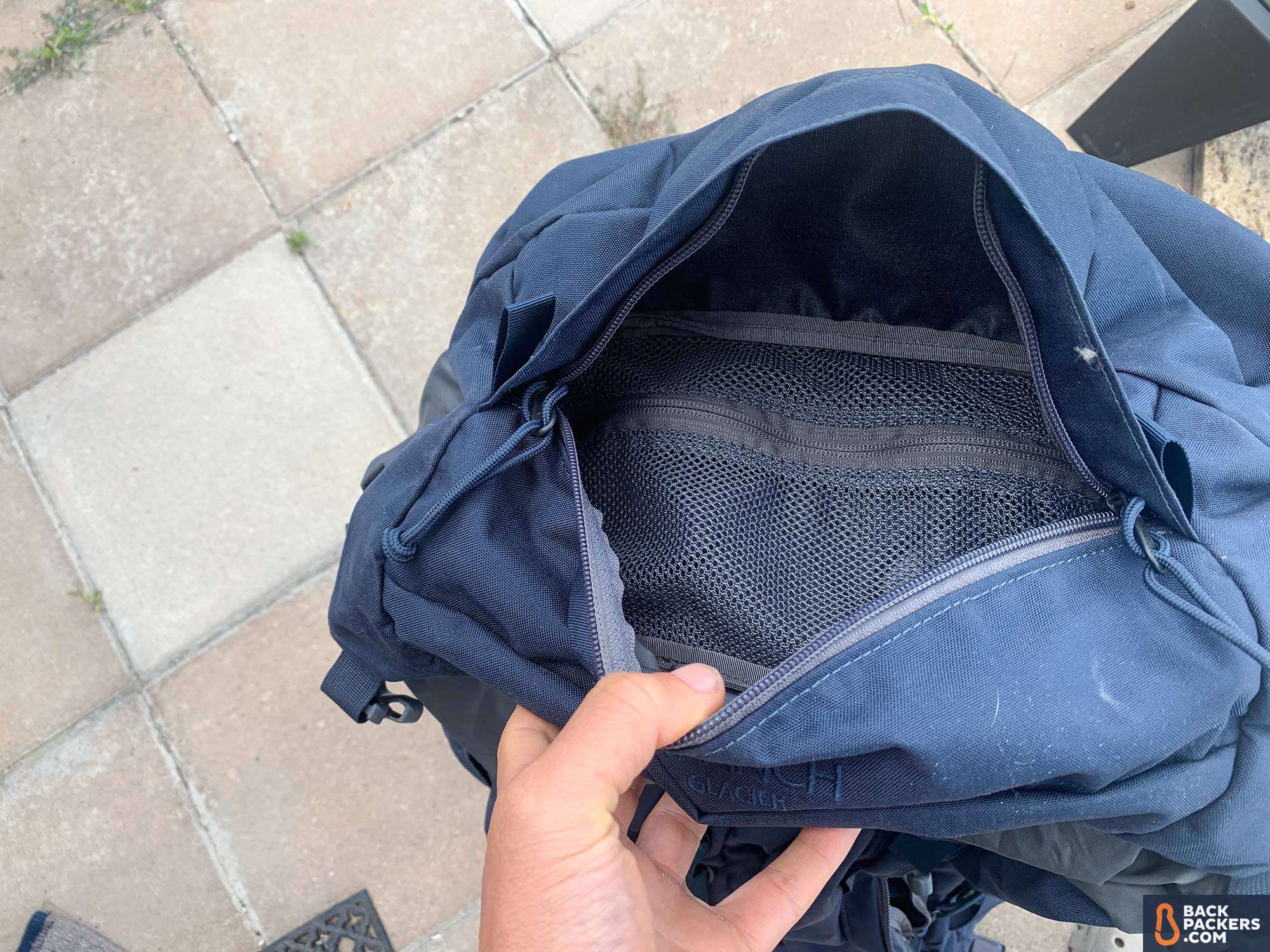 Mystery Ranch Glacier Review: Rugged Pack for Wild Trails 6 Mystery-Ranch-Glacier-top-lid-zipper-storage