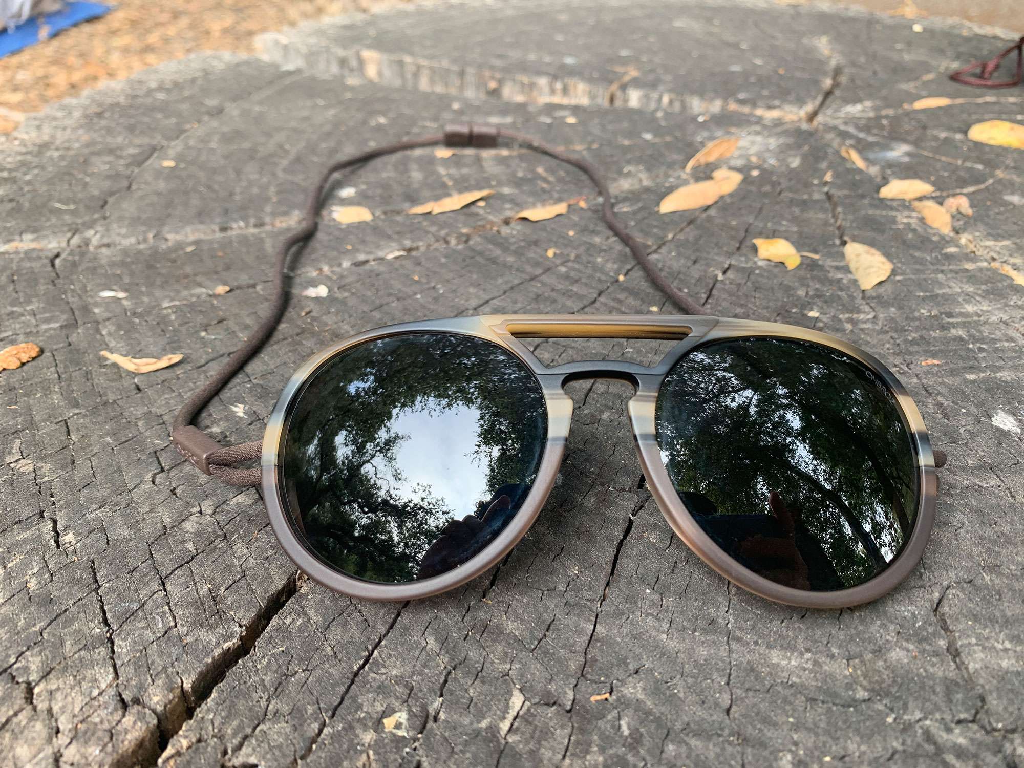 Ombraz Dolomite Armless Sunglasses Review 2 Ombraz-Dolomite-Review-on-wood-stump