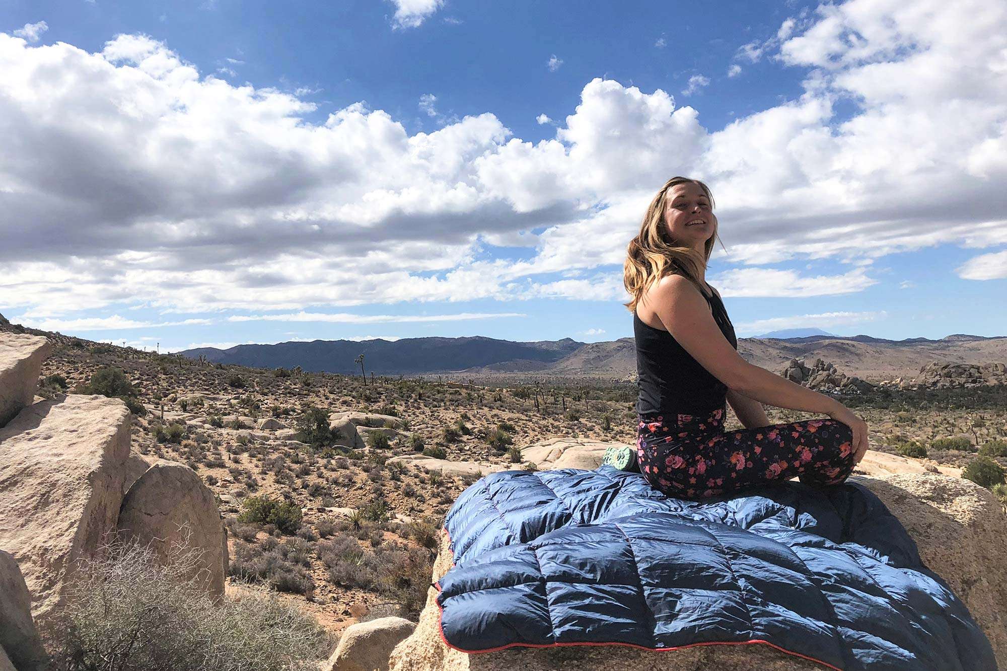 Rumpl Down Puffy Blanket Review 9 Rumpl-Down-Puffy-Blanket-review-on-rock-with-view-featured