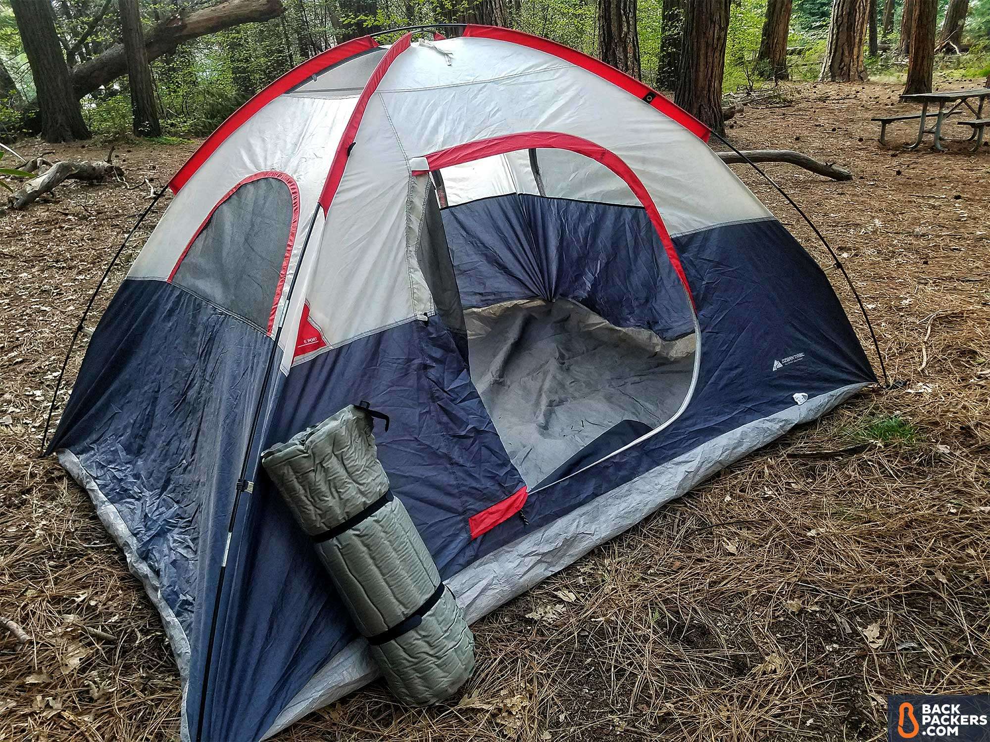 REI Camp Bed 3.5 Sleeping Pad Review 1 rei-camp-bed-3.5-review-rolled-up-next-to-tent